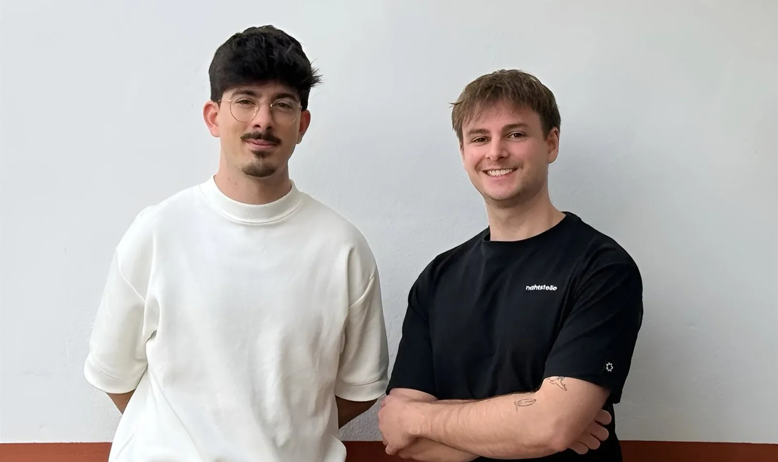 Nicklas Scharpff and Joan Rodriguez of QuiverAI, smiling against a white wall